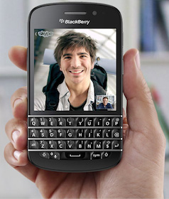 hand holding a blackberry 10 image
