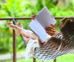 Person reading in a hammock image